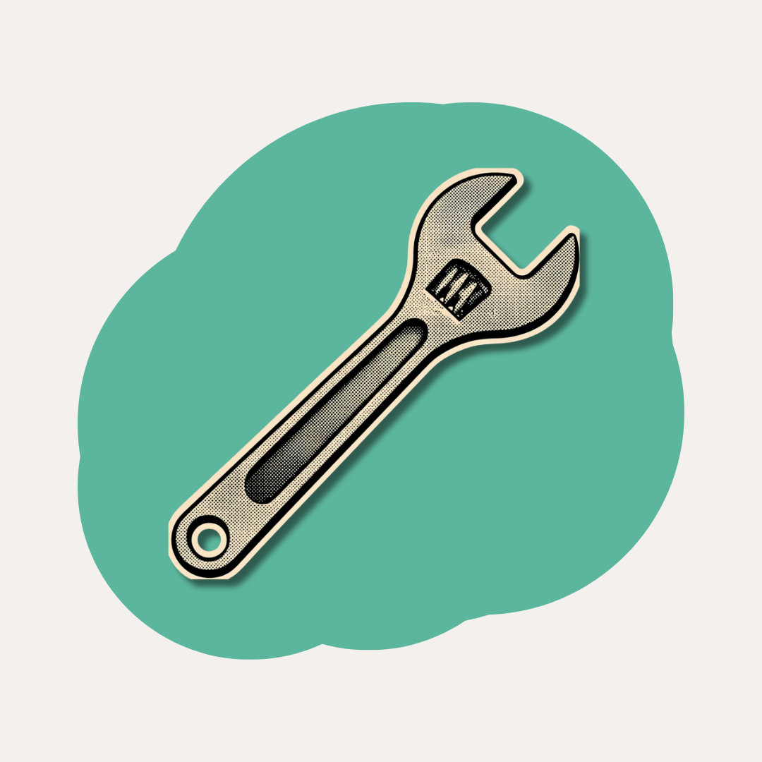 Une clé à molette pour symboliser les outils concrets